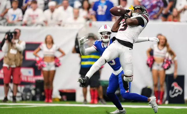 Houston Texans cornerback Kamari Lassiter (3) breaks up a pass against the Buffalo Bills during the second half of an NFL football game, Sunday, Sept. 13, 2026, in Houston. (AP Photo/Ashley Landis)