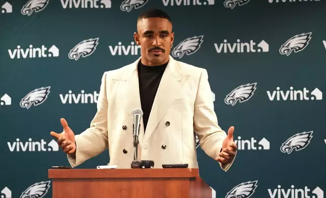 Philadelphia Eagles quarterback Jalen Hurts responds to a question during a news conference after an NFL football game against the Chicago Bears in Chicago, Monday, Sept. 28, 2026. (AP Photo/David Banks)