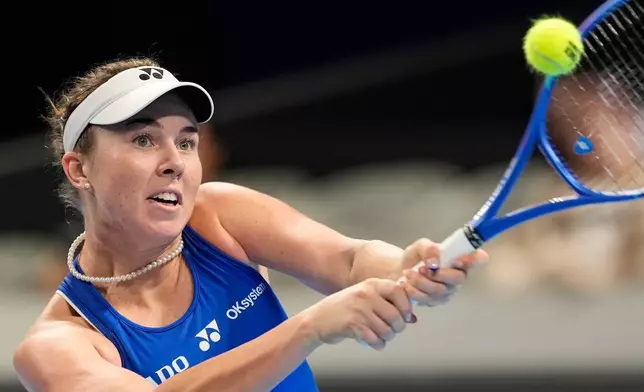 Czech Republic's Linda Noskova returns the ball to Spain's Cristina Bucsa during the Billie Jean King Cup women's singles semifinal tennis match between Spain and Czech Republic, in Shenzhen, China, Friday, Sept. 25, 2026. (AP Photo/Andy Wong)