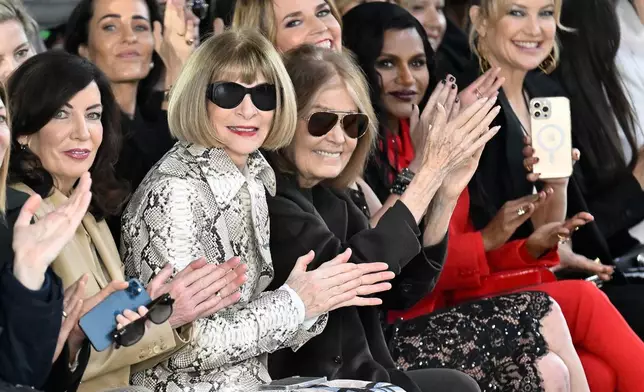 FILE - New York Governor Kathy Hochul, left, Anna Wintour and Gloria Steinem attend the Michael Kors Fall/Winter 2023 fashion show in New York on Feb. 15, 2023. (Photo by Evan Agostini/Invision/AP, File)