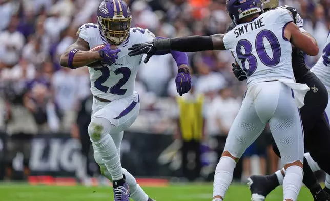 Baltimore Ravens running back Derrick Henry (22) carries against the New Orleans Saints in the first half of an NFL football game in Baltimore, Sunday, Sept. 20, 2026. (AP Photo/Stephanie Scarbrough)