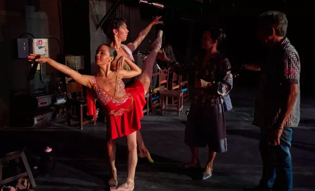 Dancers from the National Ballet of Cuba practice under the direction of National Ballet Director Viengsay Valdes, center, in Havana, Cuba, Friday, Aug. 21, 2026. (AP Photo/Ramon Espinosa)