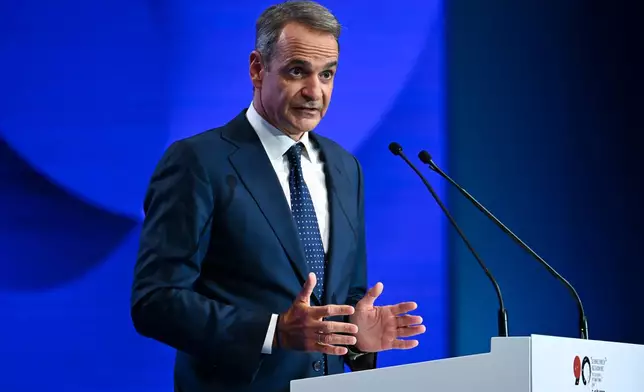 Prime Minister Kyriakos Mitsotakis delivers a speech during Thessaloniki's international trade fair, in the northern city of Thessaloniki, Greece, Saturday, Sept. 5, 2026. (AP Photo/Giannis Papanikos)