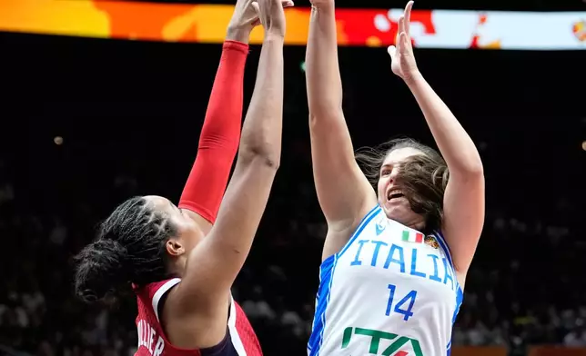 Italy's Sara Madera shoots over Napheesa Collier, of the United States, during the Women's Basketball World Cup match between the United States and Italy in Berlin, Sunday, Sept. 6, 2026. (AP Photo/Ebrahim Noroozi)