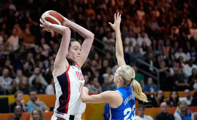 France's Marine Johannes guards Breanna Stewart, of the United States, during the Women's Basketball World Cup final match between the United States and France in Berlin, Sunday, Sept. 13, 2026. (AP Photo/Ebrahim Noroozi)