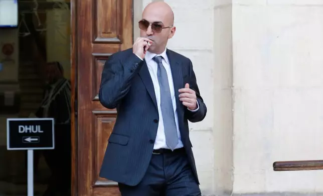 FILE - Maltese businessman Yorgen Fenech leaves court after being questioned in the 2017 bomb blast that killed investigative journalist Daphne Caruana Galizia as she drove near her home, Nov. 29, 2019, in Valletta, Malta. (AP Photo, File)