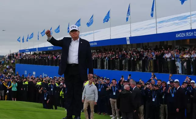 U.S. President Donald Trump attends the Irish Open golf tournament at Trump International Golf Links in Doonbeg, Ireland, Sunday, Sept. 13, 2026. (AP Photo/Julia Demaree Nikhinson)
