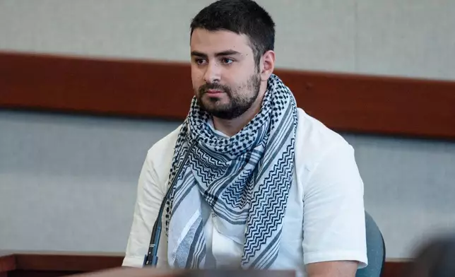 Kinnan Abdalhamid testifies in court during Jason Eaton's trial in Burlington, Vt., Monday, Sept. 14, 2026. (Glenn Russell/Pool photo via AP)