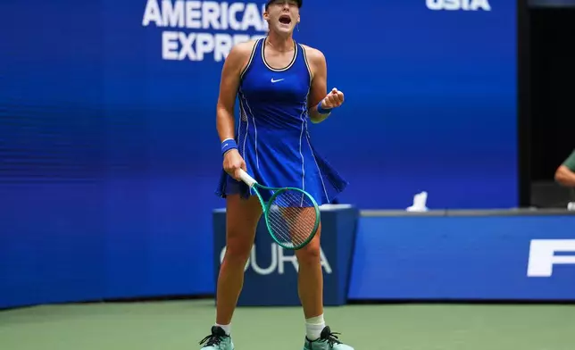 Mirra Andreeva, of Russia, reacts during a match against Coco Gauff, of the United States, during the quarterfinal round of the U.S. Open tennis championships, Wednesday, Sept. 9, 2026, in New York. (AP Photo/Kirsty Wigglesworth)