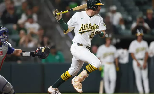 Athletics' Jeff McNeil hits a walk off RBI single during the ninth inning of a baseball game against the Toronto Blue Jays Monday, Sept. 7, 2026, in West Sacramento, Calif. (AP Photo/Scott Marshall)