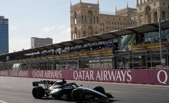 Mercedes driver George Russell of Britain steers his car during the Azerbaijan F1 Grand Prix auto race, in Baku, Azerbaijan, Saturday, Sept. 26, 2026. (AP Photo/Darko Bandic)