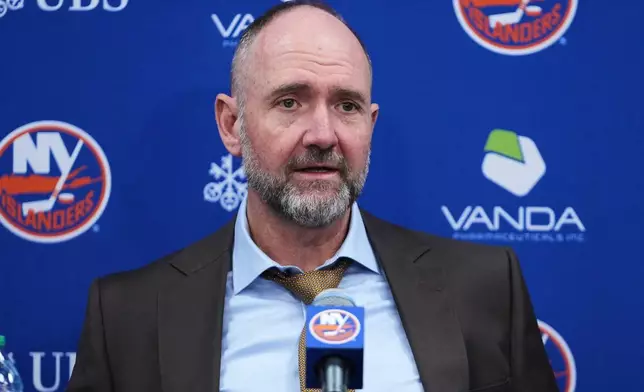 FILE - New York Islanders new head coach Peter DeBoer speaks after an NHL hockey game against the Carolina Hurricanes, April 14, 2026, in Elmont, N.Y. (AP Photo/Frank Franklin II, File)