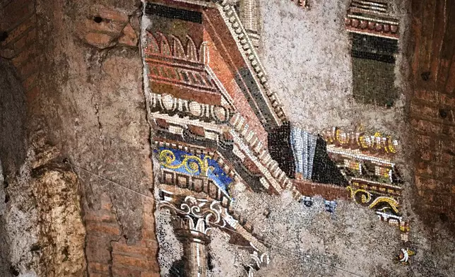 A section of the restored 15-meter ancient wall mosaic from "The Painted City" site, discovered in the late 1990s within the underground structures that served as foundations for the Baths of Trajan, is seen in Rome on Tuesday, Sept. 8, 2026. (AP Photo/Andrew Medichini)