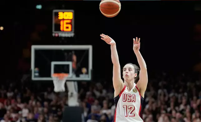 Caitlin Clark, of the United States, shoots during the Women's Basketball World Cup match between the United States and Czechia in Berlin, Monday, Sept. 7, 2026. (AP Photo/Ebrahim Noroozi)