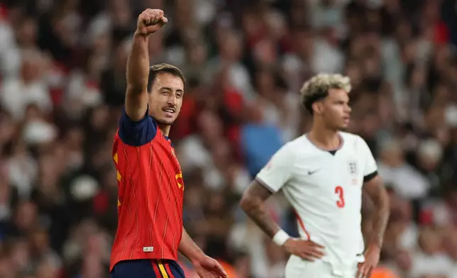 Spain's Mikel Oyarzabal, left celebrates after scoring his sides third goal during the Nations League Soccer match between England and Spain in London, Saturday, Sept. 26, 2026. (AP Photo/Ian Walton)