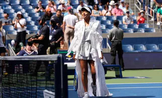 Naomi Osaka, of Japan, arrives ahead of a match against Katerina Siniakova, of the Czech Republic, during the second round of the U.S. Open tennis championships Thursday, Sept. 3, 2026, in New York. (AP Photo/Seth Wenig)