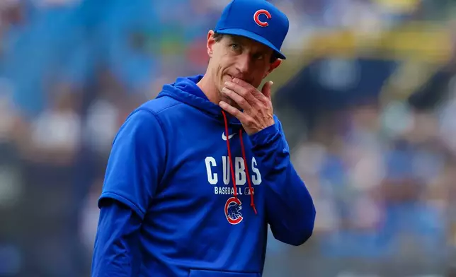 Chicago Cubs manager Craig Counsell walks back to the dugout during the fourth inning of a game against the Boston Red Sox Sunday, Sept. 27, 2026 in St. Petersburg, Fla. (AP Photo/Chris Urso)
