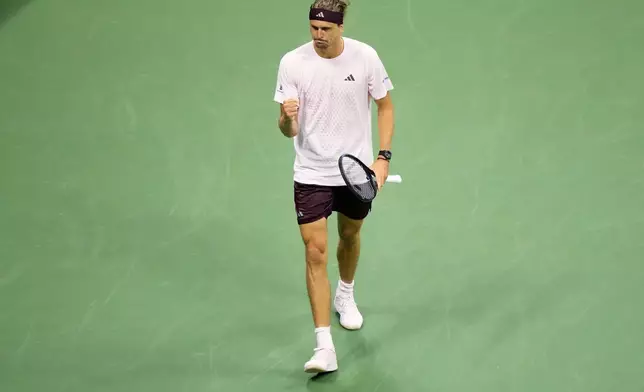 Alexander Zverev, of Germany, reacts after winning a game in the third set against Lorenzo Sonego, of Italy, during the first round of the U.S. Open tennis championships Tuesday, Sept. 1, 2026, in New York. (AP Photo/Frank Franklin II)