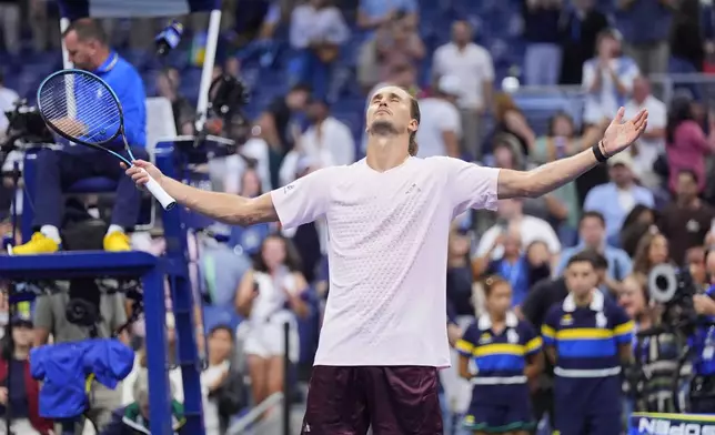 Alexander Zverev, of Germany, celebrates defeating Lorenzo Sonego, of Italy, in five sets In the first round of the U.S. Open tennis championships early Wednesday, Sept. 2, 2026, in New York. (AP Photo/Frank Franklin II)