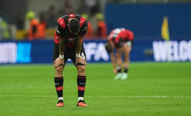 AC Milan's Mario Gila stands at the end of the Europa League opening phase soccer match between AC Milan and Benfica in Milan, Italy, Wednesday, Sept. 16, 2026. (AP Photo/Antonio Calanni)