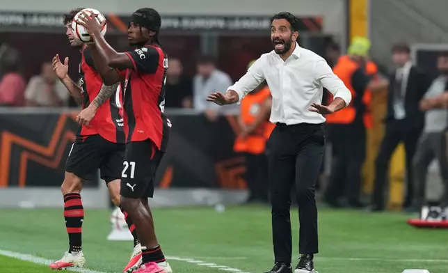 AC Milan's head coach Ruben Amorim gestures during the Europa League opening phase soccer match between AC Milan and Benfica in Milan, Italy, Wednesday, Sept. 16, 2026. (AP Photo/Antonio Calanni)
