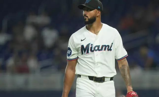 Miami Marlins starting pitcher Sandy Alcantara looks at the scoreboard as he leave the field during the first inning of a baseball game against the New York Mets Tuesday, Sept. 8, 2026, in Miami. (AP Photo/Marta Lavandier)