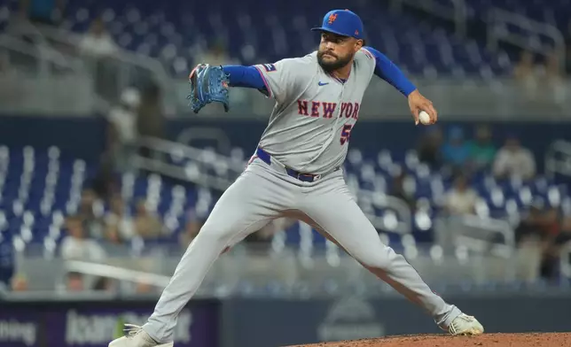 New York Mets starting pitcher Sean Manaea (59) aims a pitch during the second inning of a baseball game against the Miami Marlins Tuesday, Sept. 8, 2026, in Miami. (AP Photo/Marta Lavandier)
