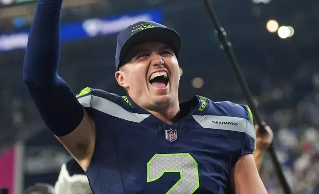 Seattle Seahawks quarterback Drew Lock celebrates after winning an NFL football game against the New England Patriots, Wednesday, Sept. 9, 2026, in Seattle. (AP Photo/Lindsey Wasson)