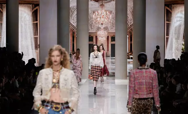 A model wears a creation part of Dolce & Gabbana women's Spring-Summer 2027 collection, presented in Milan, Italy, Saturday, Sept. 26, 2026. (AP Photo/Luca Bruno)
