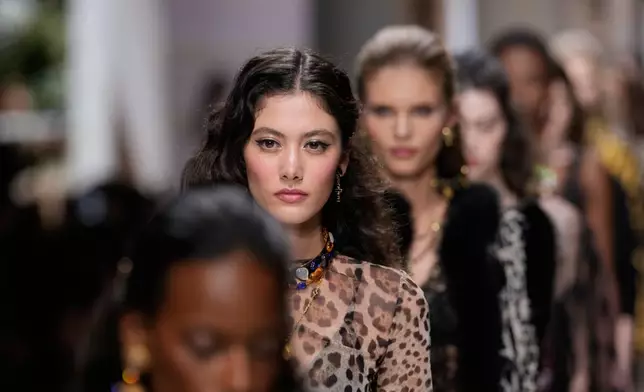 A model wears a creation part of Dolce & Gabbana women's Spring-Summer 2027 collection, presented in Milan, Italy, Saturday, Sept. 26, 2026. (AP Photo/Luca Bruno)