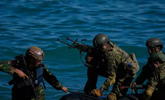 Military service members from Egypt and Greece take part in the combined armed forces exercises Medusa 15, led by Greece and Egypt at Maleme, on the Greek island of Crete on Friday, Sept. 18, 2026. (AP Photo/Thanassis Stavrakis)