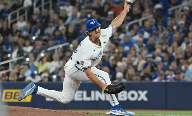 Toronto Blue Jays pitcher Brendan Cellucci (70) throws to a Detroit Tigers batter in his major league debut during the second inning of a baseball game in Toronto, Tuesday, Sept. 15, 2026. (Jon Blacker/The Canadian Press via AP)