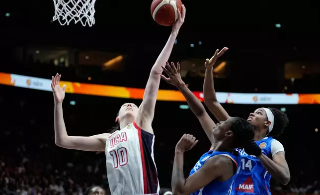 Breanna Stewart, of the United States, gets a rebound during the Women's Basketball World Cup final match between the United States and France in Berlin, Sunday, Sept. 13, 2026. (AP Photo/Ebrahim Noroozi)