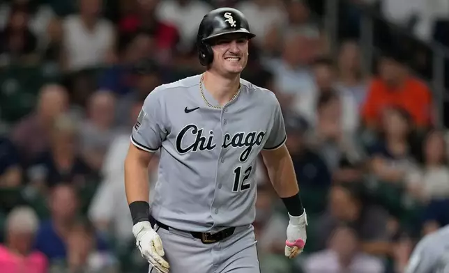 Chicago White Sox's Colson Montgomery grimaces after being hit by a pitch thrown by Houston Astros starting pitcher Hayden Wesneski during the second inning of a baseball game Wednesday, Sept. 2, 2026, in Houston. (AP Photo/David J. Phillip)