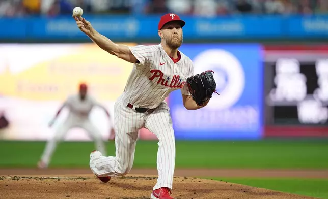 Philadelphia Phillies' Zack Wheeler pitches during the first inning of a baseball game against the Milwaukee Brewers, Tuesday, Sept. 22, 2026, in Philadelphia. (AP Photo/Matt Rourke)