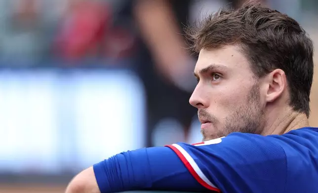 Texas Rangers center fielder Evan Carter looks on during the ninth inning of a baseball game against the Minnesota Twins, Sunday, Sept. 27, 2026, in Minneapolis. (AP Photo/Matt Krohn)