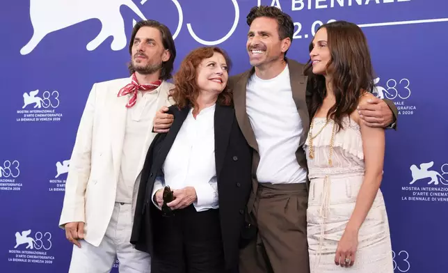 Luca Marinelli, from left, Susan Sarandon, director Andrea Pallaoro and Alicia Vikander pose for photographers at the photo call for the film 'The Echo Chamber' during the 83rd edition of the Venice Film Festival in Venice, Italy, on Sunday, Sept. 6, 2026. (Photo by Scott A Garfitt/Invision/AP)