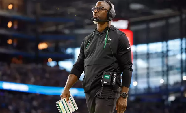 New York Jets head coach Aaron Glenn watches during the second half of an NFL football game against the Detroit Lions in Detroit, Sunday, Sept. 27, 2026. (AP Photo/Ray Del Rio)