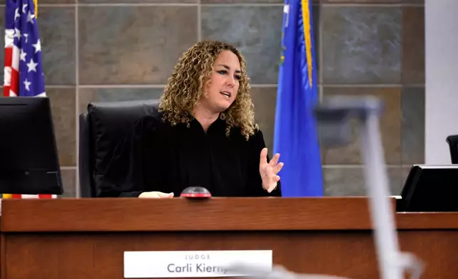 District Court Judge Carli Kierny prepares to read jury instructions before closing arguments in the Duane Davis murder trial, related to the 1996 killing of rapper Tupac Shakur, in Clark County District Court at the Regional Justice Center in Las Vegas, Monday, Aug. 31, 2026. (Steve Marcus/Pool Photo via AP)
