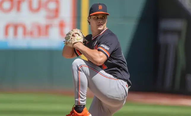 Detroit Tigers starting pitcher Jackson Jobe winds up to deliver against the Cleveland Guardians during the first inning of a baseball game, Sunday, Sept. 6, 2026, in Cleveland. (AP Photo/Phil Long)