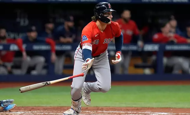 Boston Red Sox's Roman Anthony watches his two-run single off Tampa Bay Rays pitcher Ian Seymour during the second inning of a baseball game Friday, Sept. 18, 2026, in St. Petersburg, Fla. (AP Photo/Chris O'Meara)