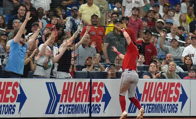Boston Red Sox third baseman Caleb Durbin (5) catches a pop out by Tampa Bay Rays' Liam Hicks during the eighth inning of a baseball game Friday, Sept. 18, 2026, in St. Petersburg, Fla. (AP Photo/Chris O'Meara)
