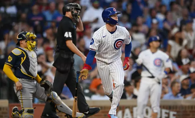 Chicago Cubs' Pete Crow-Armstrong watches his two-run home run during the third inning of a baseball game against the Milwaukee Brewers in Chicago, Thursday, Sept. 3, 2026. (AP Photo/Paul Beaty)