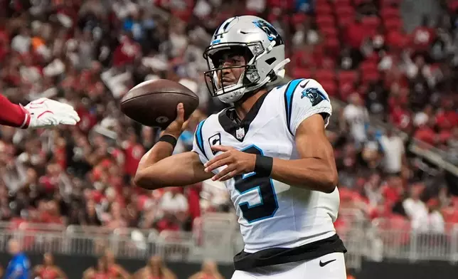 Carolina Panthers quarterback Bryce Young (9) looks to pass the ball during an NFL football game against the Atlanta Falcons in Atlanta, Sunday, Sept. 20, 2026. (AP Photo/Mike Stewart)