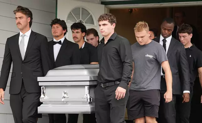 Pallbearers carry a casket containing the remains of Glenwood "Bubba" Pysher IV who was killed by police in Pottstown, Pa., Monday, Aug. 31, 2026. (AP Photo/Matt Rourke)