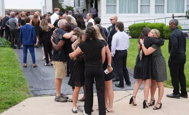 Mourners gather to pay their respects to Glenwood "Bubba" Pysher IV who was killed earlier by police in Pottstown, Pa., Monday, Aug. 31, 2026. (AP Photo/Matt Rourke)