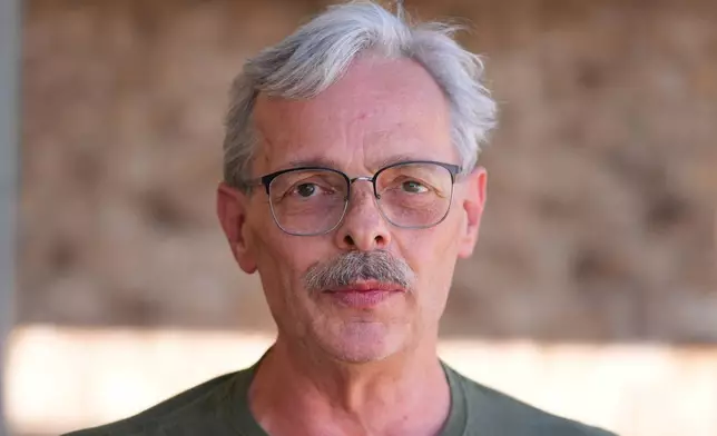 Ed Westrick, 59, pauses while talking at his rural home near Commerce, Texas, Friday, Sept. 18, 2026. (AP Photo/LM Otero)