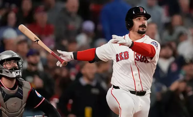 Boston Red Sox's Mickey Gasper watches the flight of his solo home run during the eighth inning of a baseball game against the Cleveland Guardians, Tuesday, Sept. 22, 2026, in Boston. (AP Photo/Charles Krupa)
