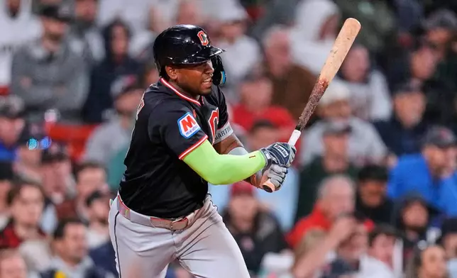 Cleveland Guardians' Angel Martínez watches his single during the seventh inning of a baseball game against the Boston Red Sox, Tuesday, Sept. 22, 2026, in Boston. (AP Photo/Charles Krupa)