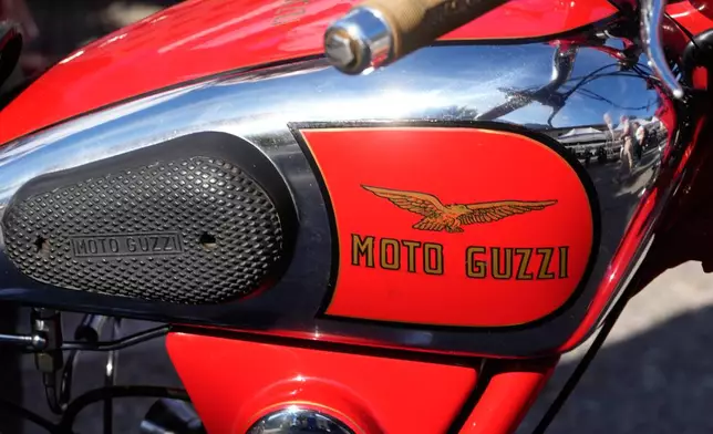 A vintage Moto Guzzi motorcycle is displayed during the Moto Guzzi opening inaugurating its completely redeveloped historic factory and new museum as the motorcycle maker celebrates its 105th anniversary, in Mandello del Lario, Thursday, Sept. 3, 2026. (AP Photo/Luca Bruno)